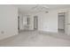 Spacious main bedroom with ceiling fan and separate vanity area at 10317 W Desert Forest Cir, Sun City, AZ 85351