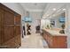 Large primary bathroom featuring dual sinks, and a large walk in closet at 10801 E Happy Valley Rd # 86, Scottsdale, AZ 85255