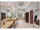 Spacious primary bathroom features dual vanities, a soaking tub, and abundant natural light at 10801 E Happy Valley Rd # 86, Scottsdale, AZ 85255