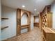 Wine cellar with custom wood racking and tile flooring at 10801 E Happy Valley Rd # 86, Scottsdale, AZ 85255