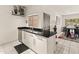 Bright kitchen with stainless steel dishwasher and sleek granite countertops at 11333 N 92Nd St # 1021, Scottsdale, AZ 85260