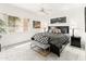 Comfortable bedroom with natural light, modern decor, and a ceiling fan at 11333 N 92Nd St # 1021, Scottsdale, AZ 85260