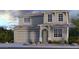 Beautiful two-story home with a two car garage and charming architectural details at 16807 W Hope Dr, Surprise, AZ 85388