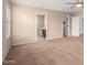 Neutral Primary bedroom with carpet flooring and closet with white doors at 17358 N 185Th Ln, Surprise, AZ 85374