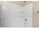 New tiled shower in a bright, clean bathroom with updated fixtures at 17358 N 185Th Ln, Surprise, AZ 85374