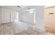 Bedroom with carpet, closet, and a doorway to the en-suite bathroom at 17443 N 99Th N Dr, Sun City, AZ 85373
