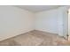 This carpeted bedroom has white walls and natural light at 17443 N 99Th N Dr, Sun City, AZ 85373
