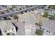 Bird's-eye view of a single-Gathering home with a large, undeveloped backyard, adjacent houses, and street access at 18856 N Comet Trl, Maricopa, AZ 85138