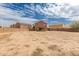 Expansive backyard space with potential for customization in a single-Gathering home and block wall fencing for privacy at 18856 N Comet Trl, Maricopa, AZ 85138