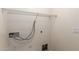 A functional laundry room features connections for appliances and wire shelving for optimal organization and storage at 18856 N Comet Trl, Maricopa, AZ 85138