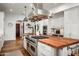Modern kitchen with a large island, stainless steel appliances, and custom cabinets at 18886 N 101St Way, Scottsdale, AZ 85255