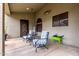Inviting covered patio area with comfortable seating, offering a relaxing outdoor space at 1954 E Vista Dr, Phoenix, AZ 85022
