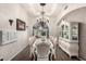 Dining room with decorative lighting, a china cabinet, and a large dining table with seating at 1954 E Vista Dr, Phoenix, AZ 85022