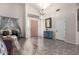 Entryway featuring wood floors, high ceilings, chandelier, statement wall decor and furniture at 1954 E Vista Dr, Phoenix, AZ 85022