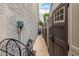 Exterior side yard featuring storage sheds, and hose, offering practical outdoor solutions and storage capacity at 1954 E Vista Dr, Phoenix, AZ 85022