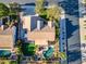Aerial view of property showcasing spacious layout, a putting green, pool, and lush landscaping at 20497 E Appaloosa Dr, Queen Creek, AZ 85142