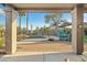 Inviting backyard with a pool, patio seating, and lush landscaping for outdoor enjoyment at 20497 E Appaloosa Dr, Queen Creek, AZ 85142