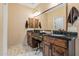 Bathroom featuring double sinks, granite countertops, and modern fixtures at 20497 E Appaloosa Dr, Queen Creek, AZ 85142