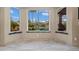 Bright bay window overlooking the beautiful pool and lush landscaping at 20497 E Appaloosa Dr, Queen Creek, AZ 85142
