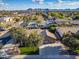 Charming single-Gathering home with manicured front yard, U.S. flag, and community views at 20497 E Appaloosa Dr, Queen Creek, AZ 85142