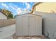 Backyard metal storage shed with double doors for additional storage and organization at 20497 E Appaloosa Dr, Queen Creek, AZ 85142