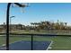 Outdoor basketball court, a great recreational area for residents to enjoy with a backdrop of palm trees at 25339 N 19Th Ln, Phoenix, AZ 85085