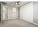 Spacious bedroom with a ceiling fan and an ensuite bathroom and closet at 25339 N 19Th Ln, Phoenix, AZ 85085