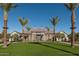 Stunning community entrance featuring lush landscaping and charming architecture at 25339 N 19Th Ln, Phoenix, AZ 85085