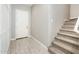 Welcoming foyer with tiled floor, neutral walls, and a staircase leading to the upper level at 25339 N 19Th Ln, Phoenix, AZ 85085