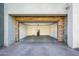 Spacious two-car garage with ample room and brick accent offering functionality and style at 25339 N 19Th Ln, Phoenix, AZ 85085