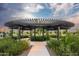Community circular pergola featuring lush landscaping, walking paths, and seating areas for relaxation and enjoyment at 25339 N 19Th Ln, Phoenix, AZ 85085