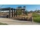 Community playground with picnic tables and covered seating, perfect for families to gather and enjoy at 25339 N 19Th Ln, Phoenix, AZ 85085
