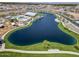 Scenic aerial view showcasing the community lake and walking paths at 25511 S 227Th St, Queen Creek, AZ 85142