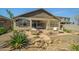Inviting backyard with a brick patio, comfortable seating, and drought-resistant landscaping at 25511 S 227Th St, Queen Creek, AZ 85142