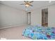 Bedroom with doorway and carpeted floors, offering comfort and neutral tones at 25511 S 227Th St, Queen Creek, AZ 85142