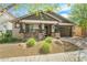 Charming single-story home with stone accents, a desert landscaped yard, and a two-car garage at 25511 S 227Th St, Queen Creek, AZ 85142