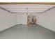 Spacious garage with epoxy flooring, ample storage, and a clean, well-lit interior at 25511 S 227Th St, Queen Creek, AZ 85142