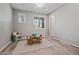 Bright playroom with a ceiling fan, a window, and play furniture at 25511 S 227Th St, Queen Creek, AZ 85142
