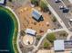 Aerial view of a playground with multiple play structures, a picnic area and nearby parking at 25511 S 227Th St, Queen Creek, AZ 85142