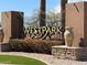Welcoming entrance to the Westpark community, featuring manicured landscaping and elegant signage at 25798 W Miami St, Buckeye, AZ 85326