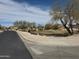 Beautiful community park featuring mature trees, manicured lawns, and walking paths for residents to enjoy at 25798 W Miami St, Buckeye, AZ 85326
