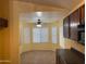 Charming dining area with natural light and a ceiling fan at 25798 W Miami St, Buckeye, AZ 85326