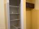 Walk-in pantry with shelving for organized storage at 25798 W Miami St, Buckeye, AZ 85326