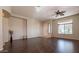 Bright living room with hardwood floors and neutral walls at 27204 N 86Th Dr, Peoria, AZ 85383