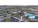 A community center with a large pool and lush landscaping for resort-style living at 2855 E Tina Dr, Phoenix, AZ 85050