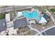 A birds-eye view of the community pool, cabanas, and lush landscaping at 2855 E Tina Dr, Phoenix, AZ 85050