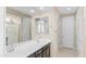 Bathroom with double sink vanity, large mirror, and walk-in shower at 2855 E Tina Dr, Phoenix, AZ 85050
