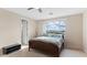 Bedroom featuring a large window and comfortable bedding at 2855 E Tina Dr, Phoenix, AZ 85050