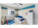 bedroom with toys, a single bed and ample storage at 2855 E Tina Dr, Phoenix, AZ 85050