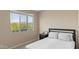 This bedroom offers a bright window and comfortable sleeping space at 2855 E Tina Dr, Phoenix, AZ 85050